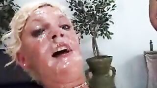 Bukkake faced white chick looks pretty with cum on her face