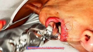 Blonde Lily is playing with a big exotic glass toy. Stretches her ass and cums