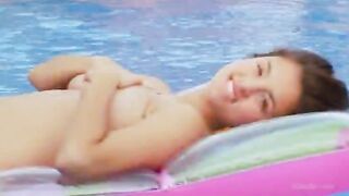 titty babe masturbating in the pool