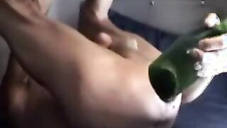 Guy Stretches Ass Out With Huge Glass Bottle