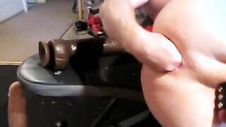 gay guy shoves an insanely huge black dildo up his gaped ass