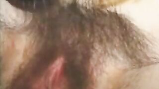 Chick Brushes Her Super Hairy Pussy Bush