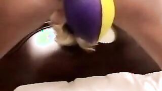 Pushing A Football Out Of Her Cunt