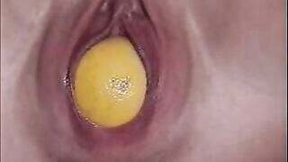 plop! birthing a grapefruit!