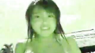 Japanese girl with big tits dancing to Van Halen Panama
