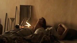 Scarlett Johansson drops down to reveal more of her left breast