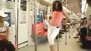japanese stripper girl pole dances on the subway