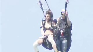 using a vibrator at 15,000 feet in the air while parasailing and squirting