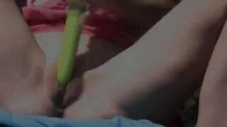 Two models playing with toys outside