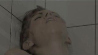 darkhair masturbation in a bathroom