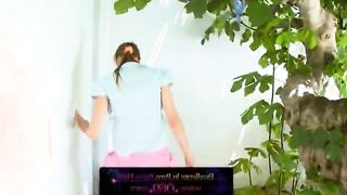 twenty girlfriend peening from the trees