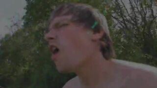 Young couple sex by the lake