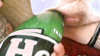 Horny slut takes a bottle in her pussy