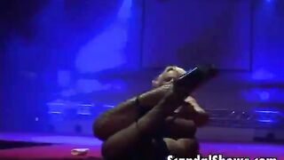 Blonde girl dances and spreads her legs
