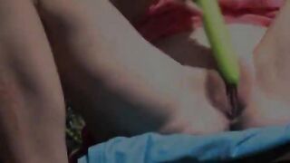 Two pornstars playing with toys outside