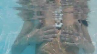 Naughty girl tease in the pool