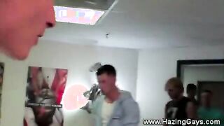 A wanker is trying to join in the fraternity by being hazed