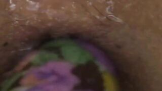 violet dildo in a asian butthole