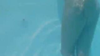 Naughty undine naked in the swimmingpool