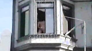 dude jerking off out his window while the crowd cheers him on