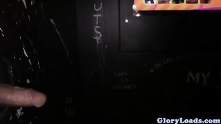 Gloryhole loving latina sucks cock as she gets cum showered