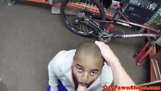Interracial blowjob in pawnshop backroom