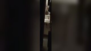 Cristy Thom topless in a bathroom
