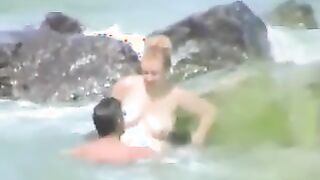 Couple Having Sex At The Sea