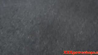 Pawn broker makes an amateur girl strip in front of the camera