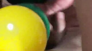 College couple get frisky in playpen of balls