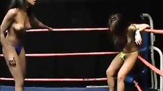 An Ebony Chick And Asian Chick Fighting