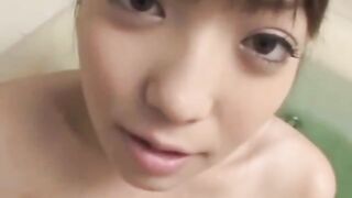 Knocked up asian playing with cock