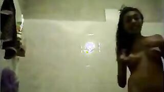 Sexy teen girlfriend does a shower show for her bf
