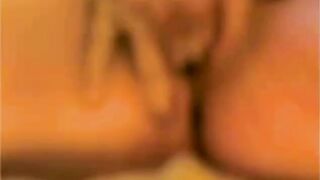 Girl in bed to satisfy themselves with a vibrator