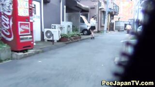 Japanese piss in street