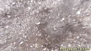Hairy asian seen pissing