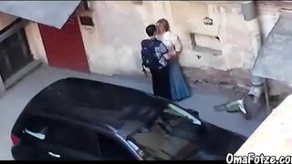 Chubby mature fucks with a man in the parking lot, public sex