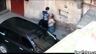 A man fucks hard chubby mature's mouth in public