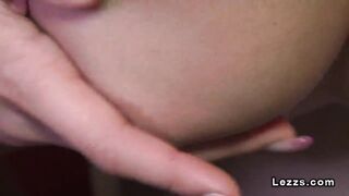 Lesbians in Santa Claus costumes finger