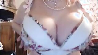 Busty huge tit blonde babe strips and teases