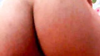 Curly haired shemale bitch Fernanda slurping a monster penis on her knees