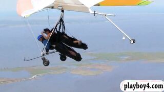 Sexy girls hang gliding and snowboarding while theyre naked