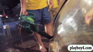 Three hot playmates in bikini enjoyed waterball fighting