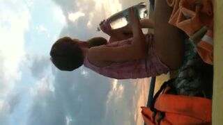 Blond stud ravishing his tanned woman in a rubber boat