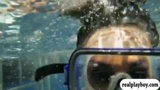 Badass babes swam in shark cage and snowboarding while naked