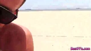 Lovely ladies play two kinds of balls on the beach