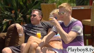 Group of swingers have fun in the pool playing nasty games