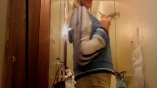 Naughty blonde with big boobs shows off her hot body