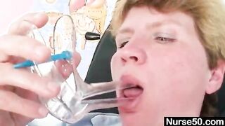 Chubby Milf Masturbates Self With Spreader Tool