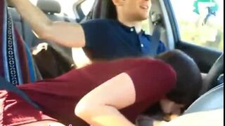 Sucking her boyfriend on car